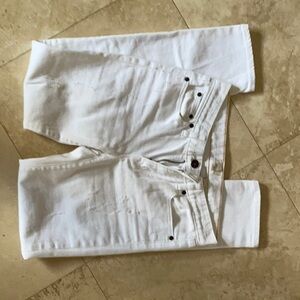 J Crew white jeans. Distressed look but no holes. Ankle length.